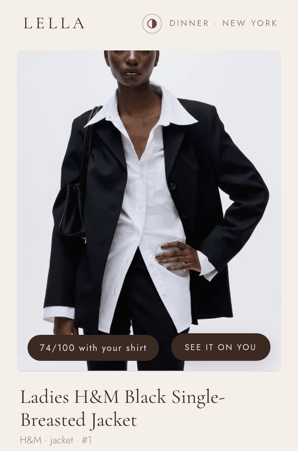 A result card in the app: a black single-breasted jacket from a real store, with the score &ldquo;74/100 with your shirt&rdquo; and a &ldquo;See it on you&rdquo; button.